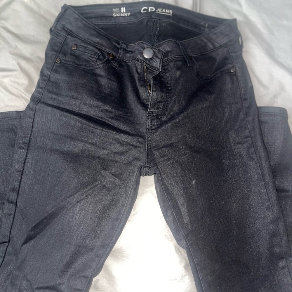 Black jeans, coated with leather a little bit